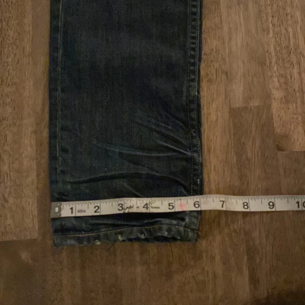 All Saints Spitalfields Jack’s Place skinny dark blue jeans from Neiman Marcus